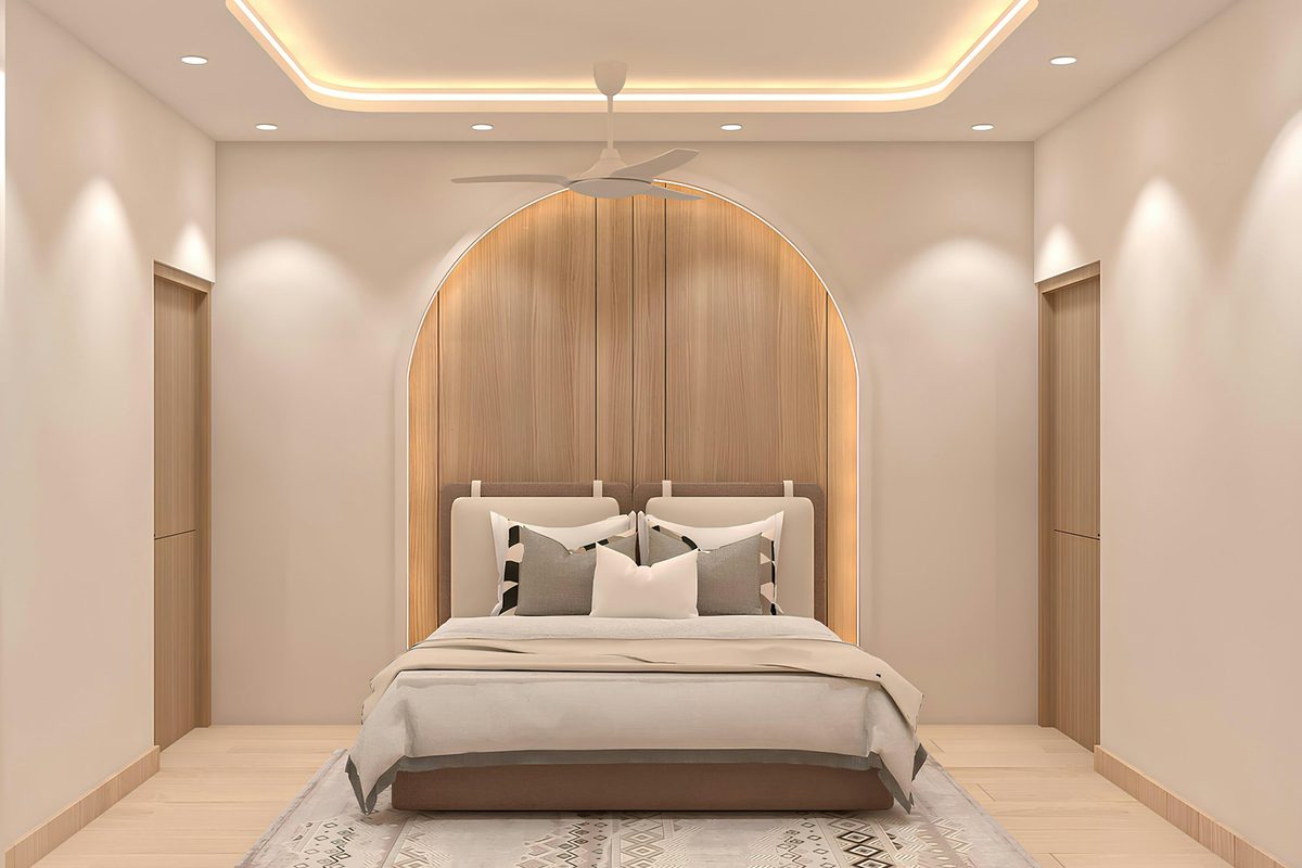 Bedroom with arched panelling and cove lighting